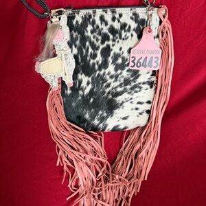 Holy Cow NEW sling shot $185 Stylish Black and White with beautiful Pink Fringe